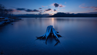 Lake shore boat mountain night - a mountain in the background free wallpaper