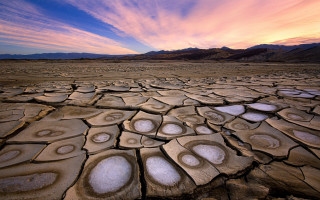 Desert landscape clouds rocks beach - a desert landscape free wallpaper for desktop