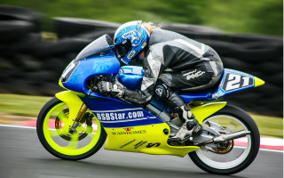 Motorcycle rider blurry helmet jigsaw - a race track free wallpaper