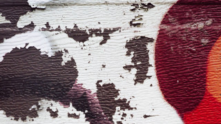 Red black wall graffiti japanese - a close up of a wall free wallpaper