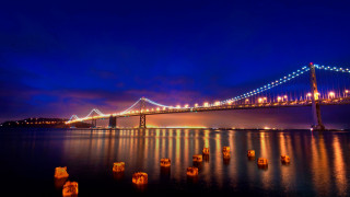 Glowing bridge reflection city lights - land art free wallpaper for desktop