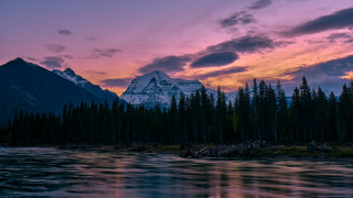 Mountain river forest sunset cityscape - the foreground and a sunset in the background free wallpaper for desktop