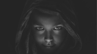 Hooded woman nosepiercing blackbackground photorealistic - photorealistic portrait free wallpaper