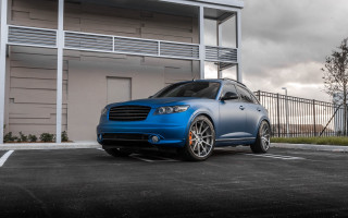 Blue car parking lot building - a balcony free wallpaper for desktop