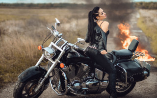 Woman motorcycle fire grass field - a motorcycle free wallpaper