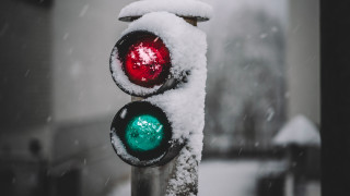 Snowy traffic light winter street - a traffic light free wallpaper