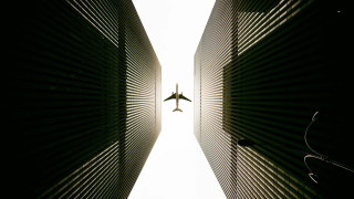 Plane building sky person fence - a sky background and a person free wallpaper