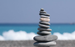 Rock stack beach ocean wave - a stack of rocks free wallpaper