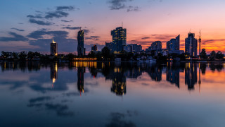 City skyline reflection sunset architecture - free city wallpaper