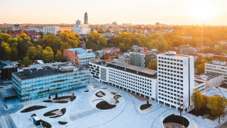 Tokyo cityscape sunset trees buildings - akseli gallenkallela free wallpaper