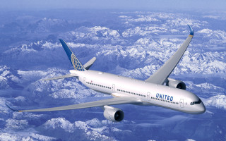 Jetliner flying over mountains blue - eiq free wallpaper for desktop