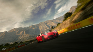 Red sports car mountains clouds 9 - the sky above free wallpaper for desktop