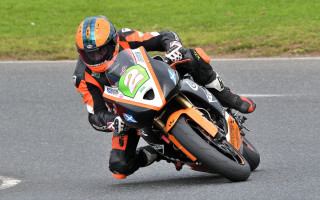 Motorcycle rider race track helmet 2 - grass free wallpaper