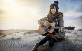 Woman sitting guitar beach smiling - chizuko yoshida free wallpaper for desktop