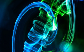 Blue green swirl hologram spirals - a white circle free wallpaper