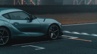 Blue sports car road building - a yellow line free wallpaper