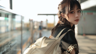 Woman backpack wall serious braid - a backpack free wallpaper