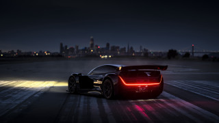Black sports car night city 3 - a city skyline in the background free wallpaper