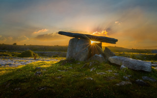 Rock formation sunset clouds field - in a field free wallpaper