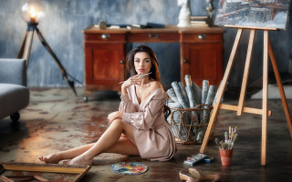 Woman sitting easel painting photorealistic - the floor in front free wallpaper for desktop