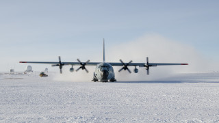 Plane landing snowy runway dust - dust free wallpaper