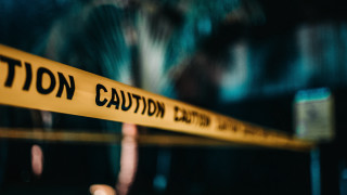 Caution sign blurry building tree - anamorphic free wallpaper for desktop