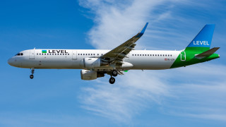 Large passenger jet flying blue 4 - the side of the plane free wallpaper