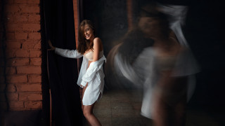Woman white dress brick wall 2 - motion blur free wallpaper
