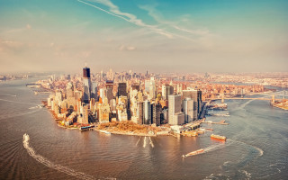 Cityscape tower water boat sunset - a large city free wallpaper