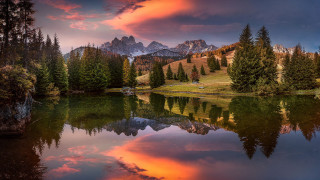 Lake mountains trees sunset cloudy 2 - a sunset in the background free wallpaper for desktop