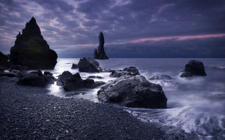 Rocky beach water mountains sky - a few rock free wallpaper