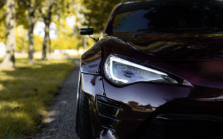 Car closeup road treeline grass - a close up of a car free wallpaper for desktop