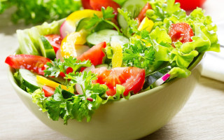 Bowl of salad with lettuce - tomato free wallpaper