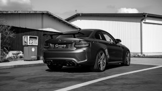 Black white car parking lot 3 - photo of a car free wallpaper