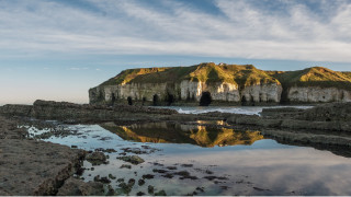 Rocky shore mountain reflections blue - a rocky shore free wallpaper for desktop