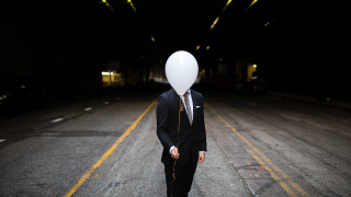 Surreal man suit balloon street - a balloon free wallpaper