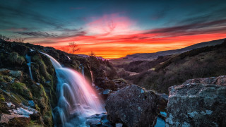 Waterfall sunset red sky rocks - a red sky in the background free wallpaper for desktop