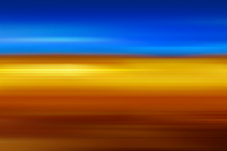 Blurry blue yellow sky plane - a blurry image free wallpaper for desktop