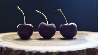 Three cherries on tree stump - christopher williams free wallpaper for desktop