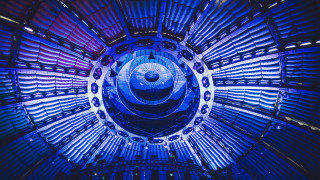 Metal blue light cage cityscape - a large metal object free wallpaper