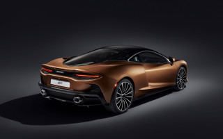 Brown sports car dark room - side profile free wallpaper