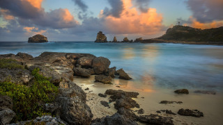 Rocky beach cross sunset clouds - rocky free wallpaper