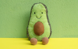 Stuffed animal green surface green - a green wall free wallpaper