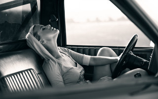 Woman driver seat closed eyes - fashion photography free wallpaper