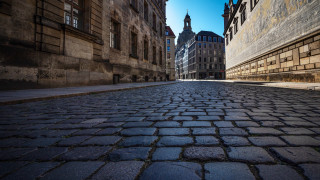 Cobblestone street clock tower berlin - a cobblestone street free wallpaper for desktop
