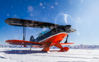 Small airplane snow field clouds - a small airplane free wallpaper for desktop