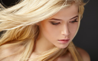 Blonde woman blowing wind closeup - airbrush free wallpaper