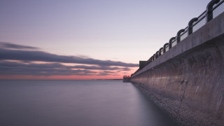 Ocean sunset mountain clouds tilt - a sunset in the background free wallpaper for desktop