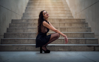 Woman black dress heels stairs - a black dress and heels free wallpaper