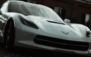 White sports car roadside building - cinematic focus free wallpaper